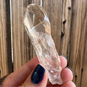 1.13 oz Clear Quartz Crystal Point with Golden Rutile Inclusions.